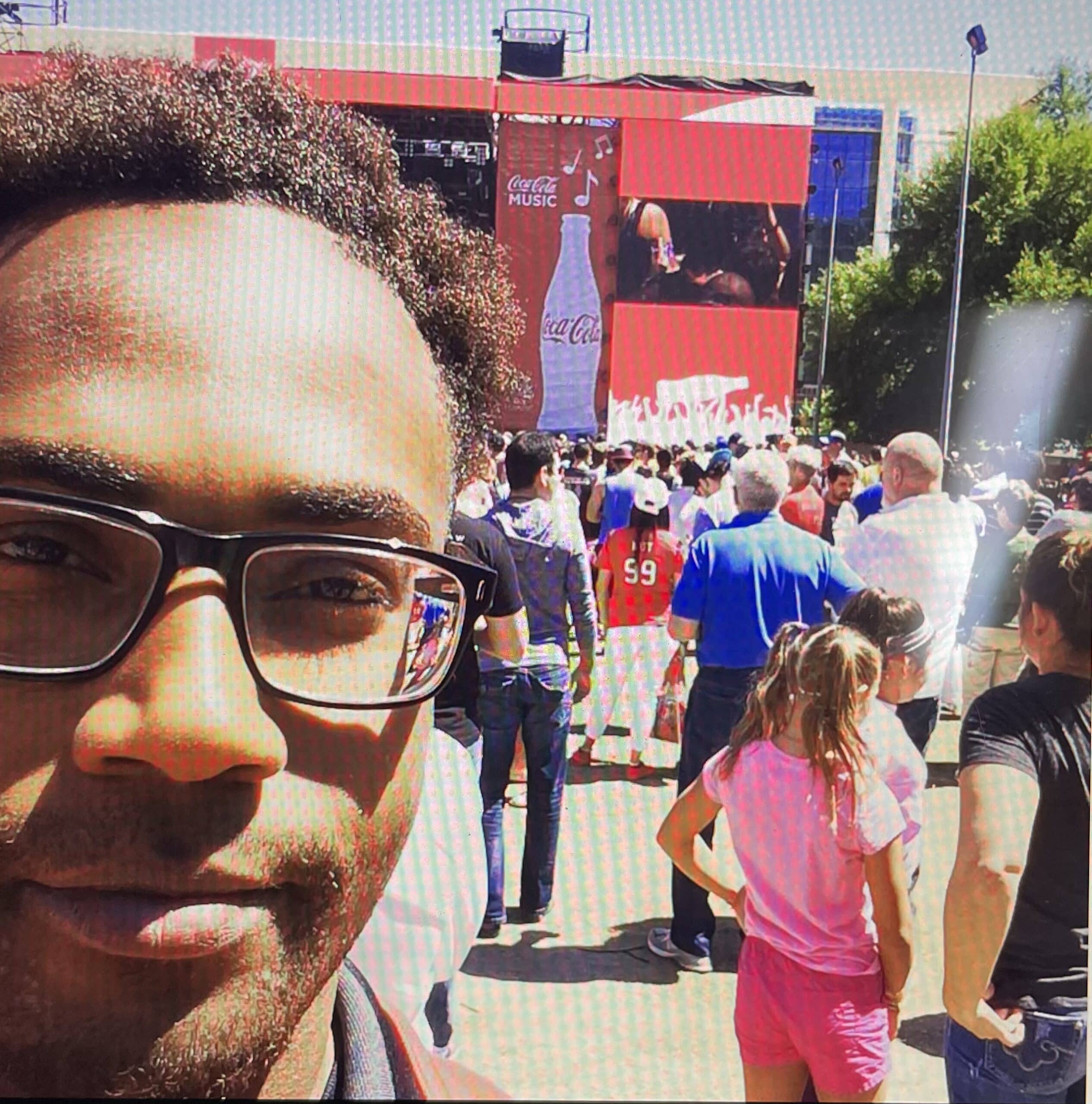 A man takes a selfie at the Kendrick Lamar concert at Discovery Green during the 2016 March Madness festival