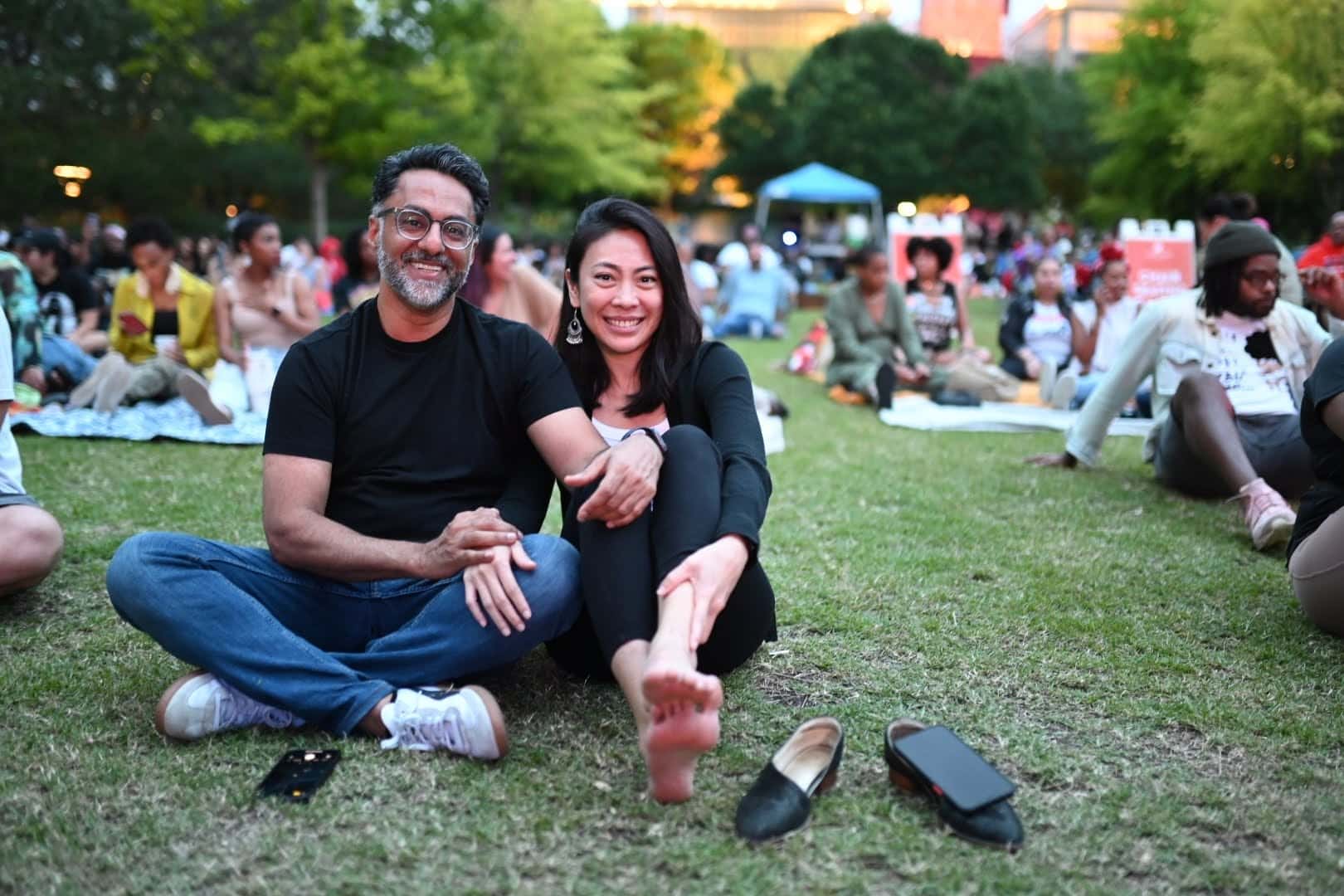 People enjoy free concerts at Discovery Green during UHD Thursday Night Concerts. Photo by Jamaal Ellis.