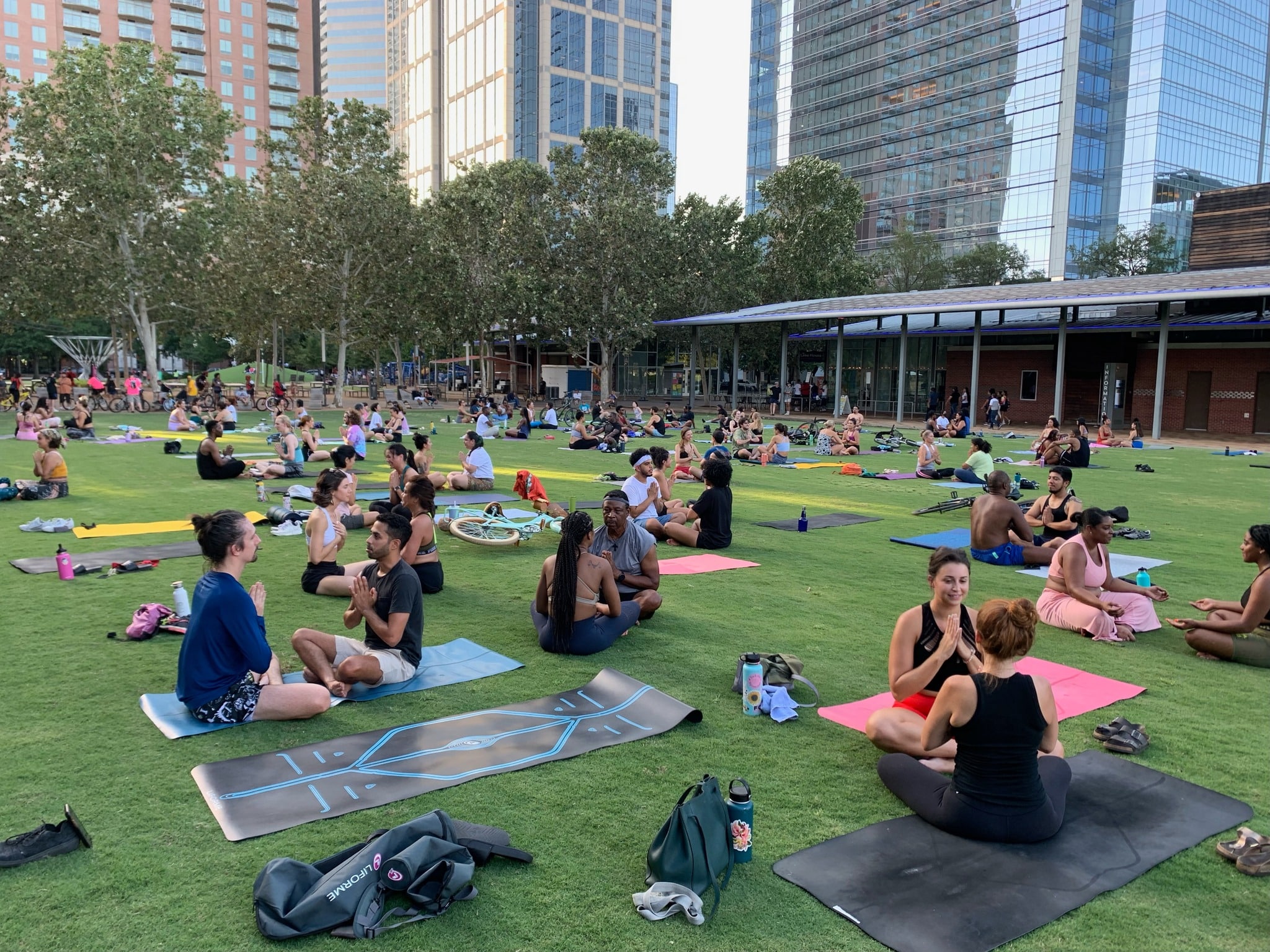 Yoga class on the green Jones lawn at Discovery Green in Downtown Houston