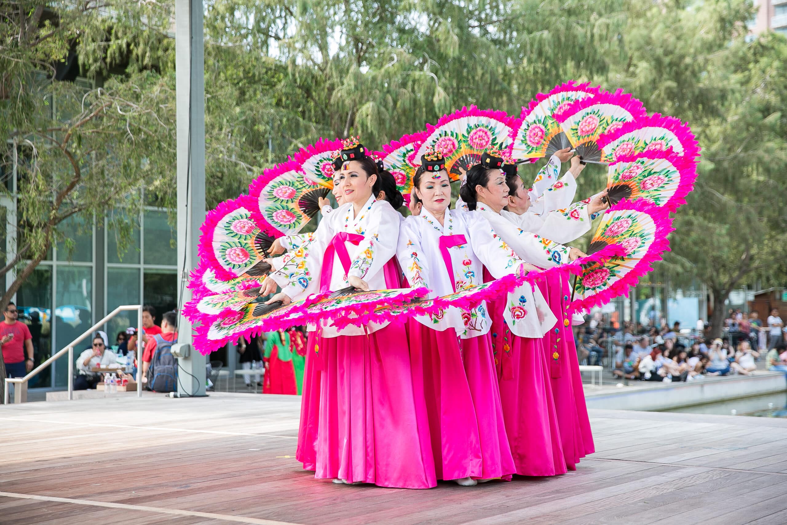 Women perform a traditional dance at the Korean Festival at Discovery Green