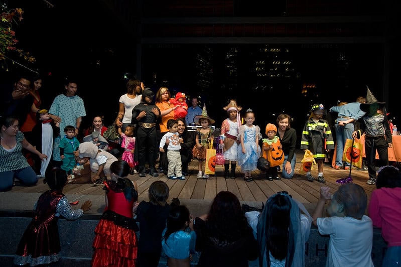 Children in costumes on stage at discovery green during Scream on the Green event