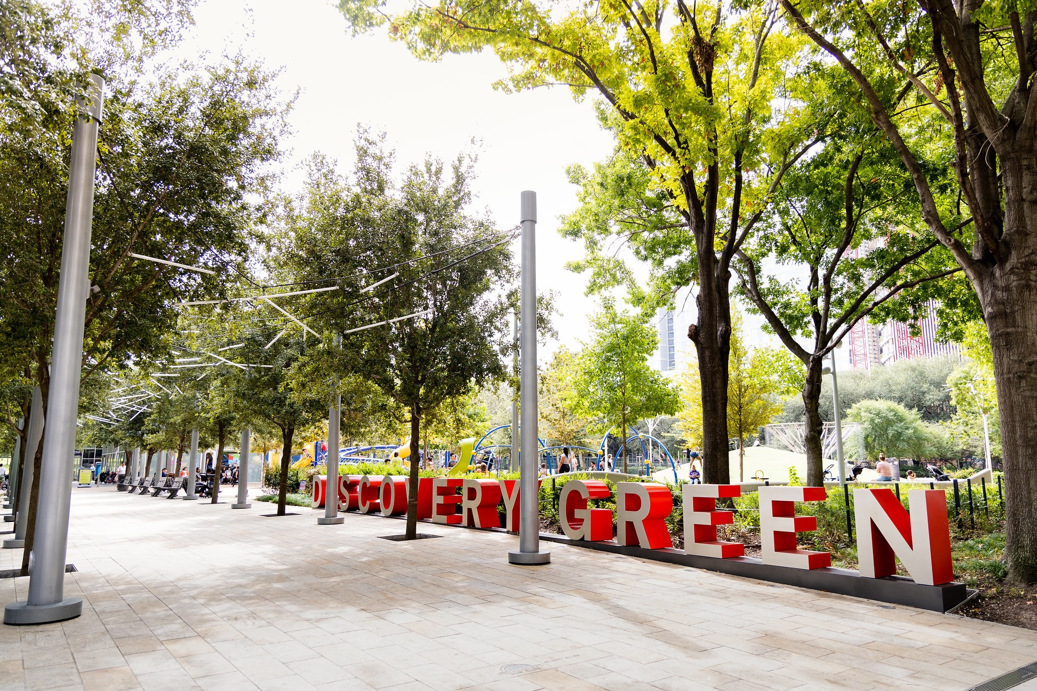 Large letters spell out Discovery Green in the entryway to the park