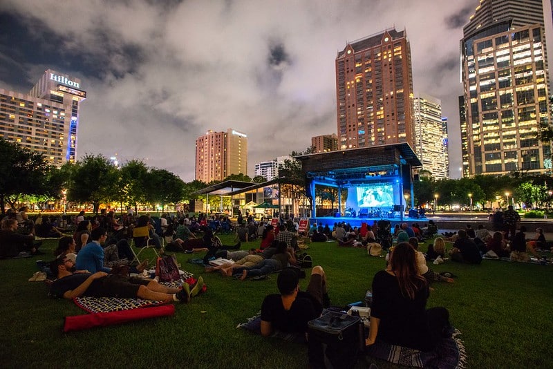 Visitors watching a film on Anhuser Stage