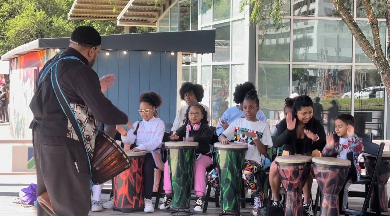 Kids enjoying a drum lesson with Dinky Drums during Spring Break